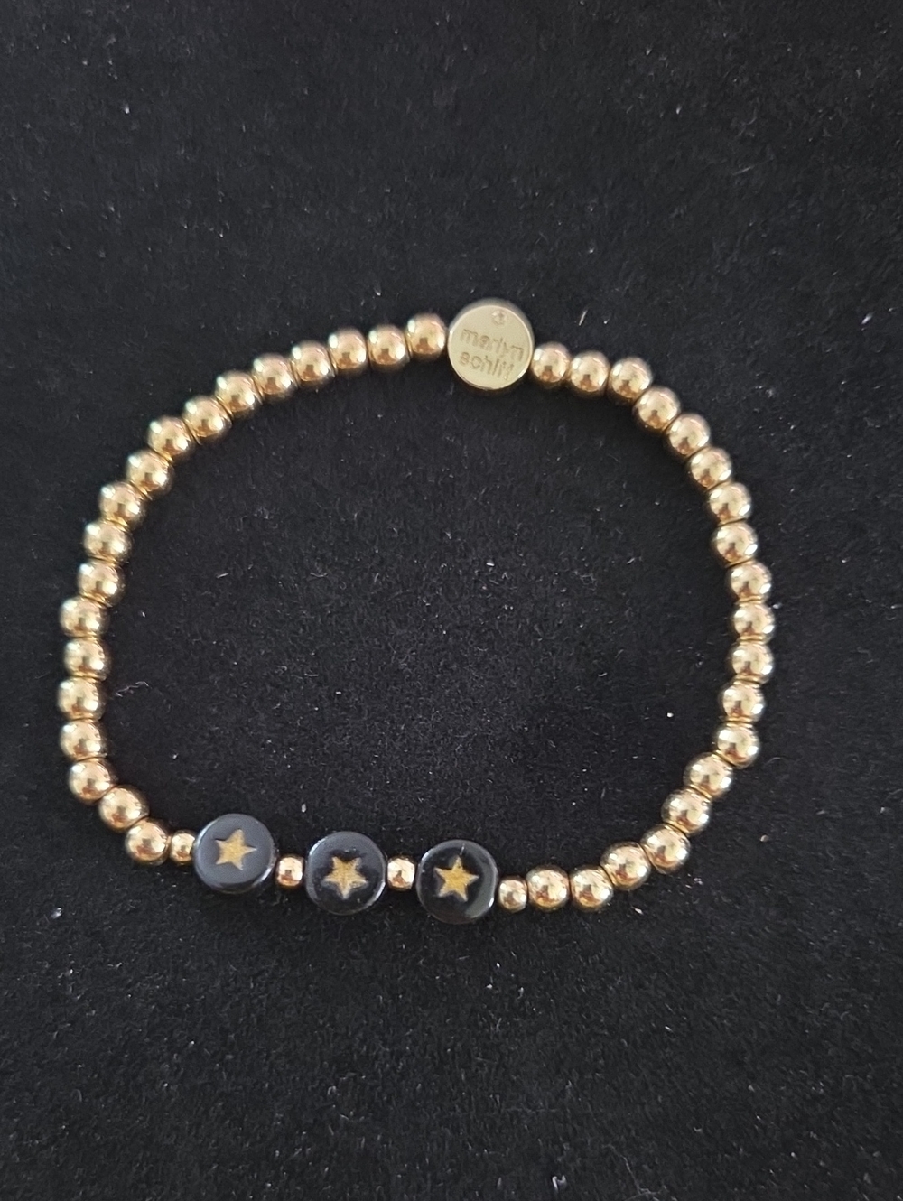 Marilyn Schiff Gold Beaded Stretch Bracelet with 3 Black Star Accent Beads